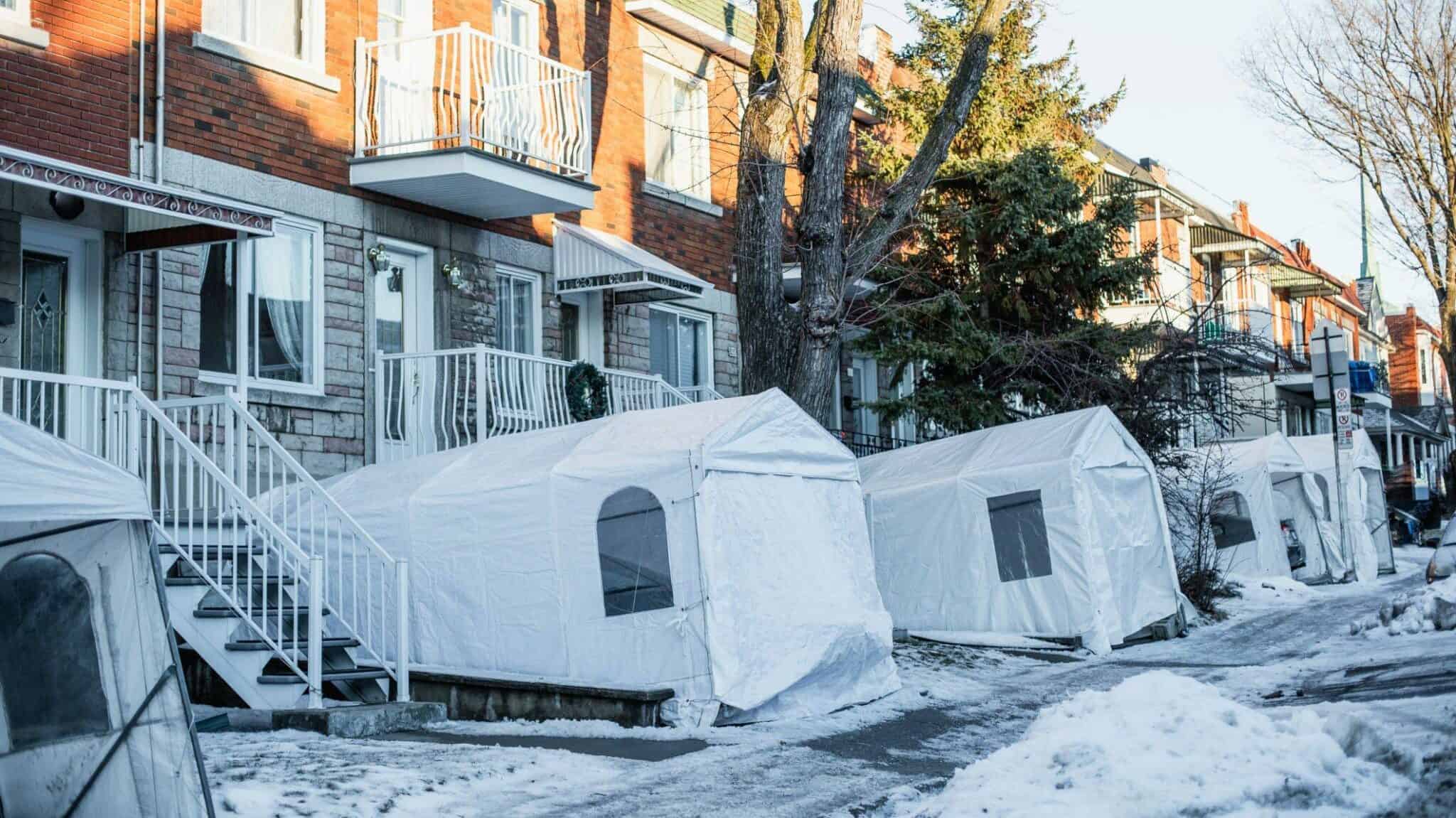 Car shelters in front of the house.